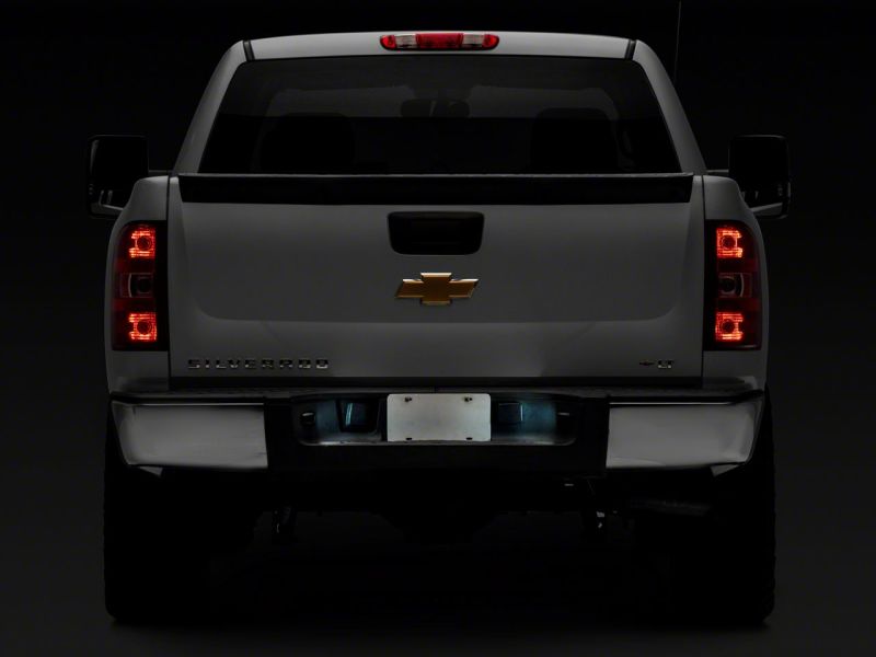 Load image into Gallery viewer, Raxiom 99-13 Chevrolet Silverado/GMC Sierra 1500 Axial Series LED License Plate Bulb Kit