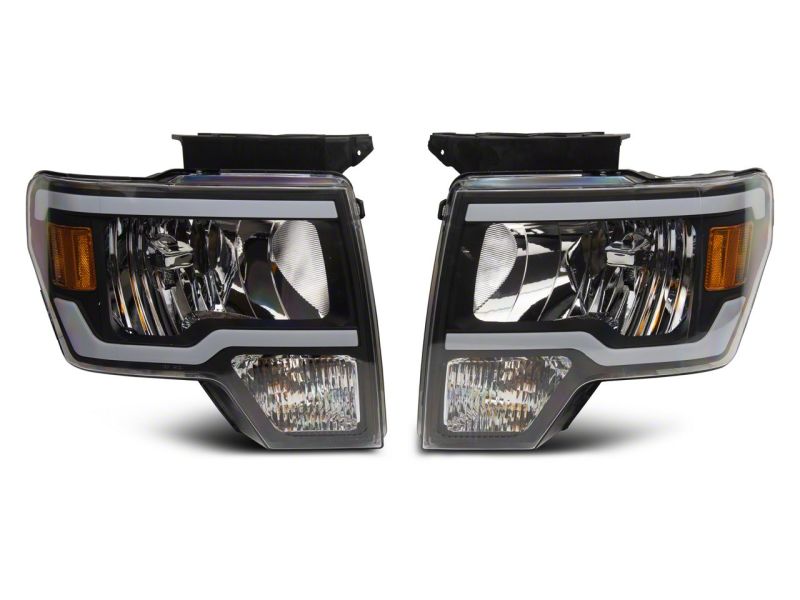 Load image into Gallery viewer, Raxiom 09-14 Ford F-150 Axial Series Headlight w/ SEQL LED Bar- Black Housing (Clear Lens)
