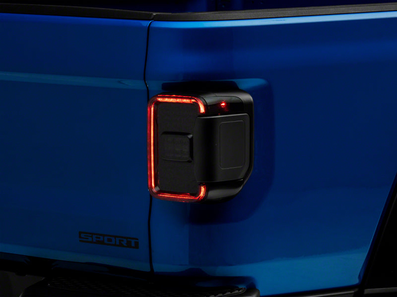 Load image into Gallery viewer, Raxiom 20-23 Jeep Gladiator JT Axial Series LED Tail Lights- Blk Housing (Smoked Lens)