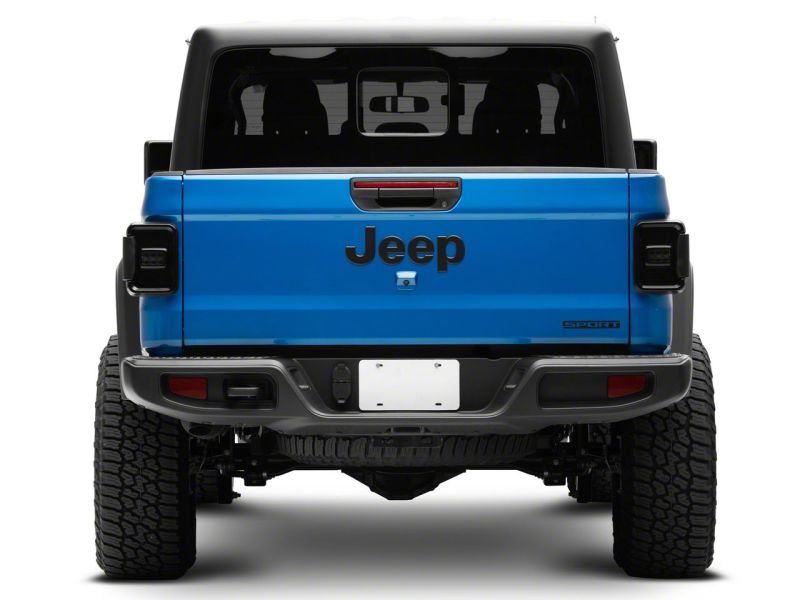 Load image into Gallery viewer, Raxiom 20-23 Jeep Gladiator JT w/ Factory Halogen LED Tail Lights- Blk Housing (Smoked Lens)