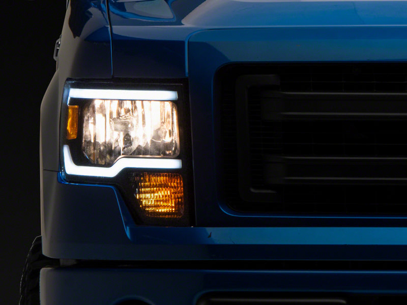 Load image into Gallery viewer, Raxiom 09-14 Ford F-150 Axial Series Headlights w/ LED Bar- Black Housing (Clear Lens)