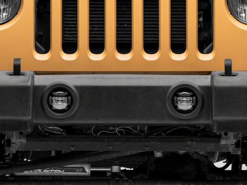 Load image into Gallery viewer, Raxiom 07-18 Jeep Wrangler JK Axial Series 4-In LED Fog Lights- Clear