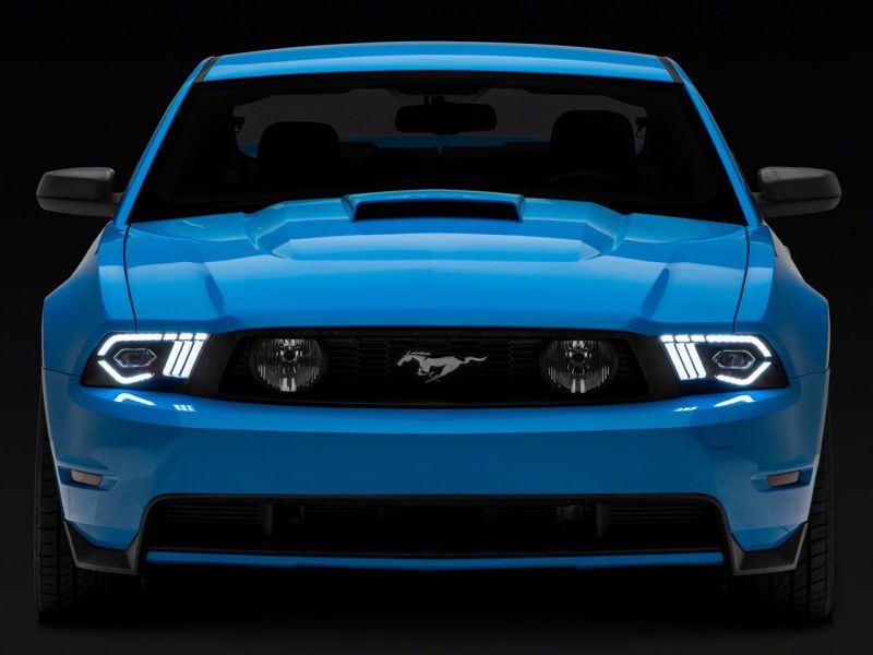 Load image into Gallery viewer, Raxiom 10-12 Ford Mustang w/ Factory Halogen LED Projector Headlights- Blk Housing (Clear Lens)