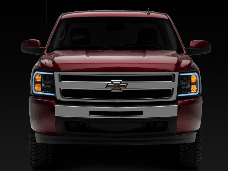 Load image into Gallery viewer, Raxiom 07-13 Chevrolet Silverado 1500 Axial Series Headlights w/ LED Bar- Black Housing (Clear Lens)