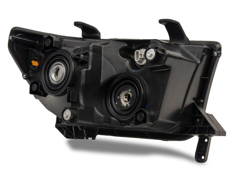 Load image into Gallery viewer, Raxiom 07-13 Toyota Tundra Axial Series Headlights w/ SEQL LED Bar- Black Housing (Clear Lens)