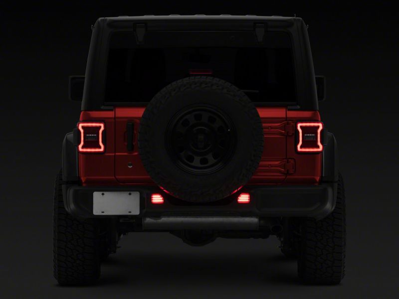 Load image into Gallery viewer, Raxiom 18-23 Jeep Wrangler JL Moab Rubicon Sahara Axial LED Rear Bumper Reflector Lights- Clear