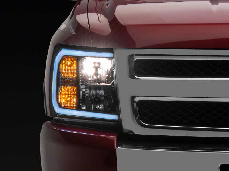 Load image into Gallery viewer, Raxiom 07-13 Chevrolet Silverado 1500 Axial Series Headlights w/ LED Bar- Black Housing (Clear Lens)