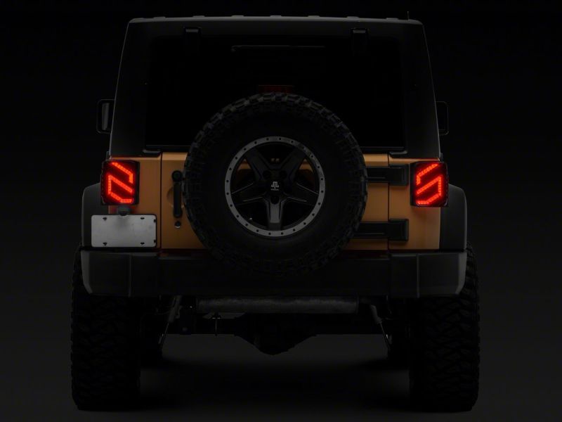 Load image into Gallery viewer, Raxiom 07-18 Jeep Wrangler JK Axial Series Trident LED Tail Lights- Blk Housing (Clear Lens)