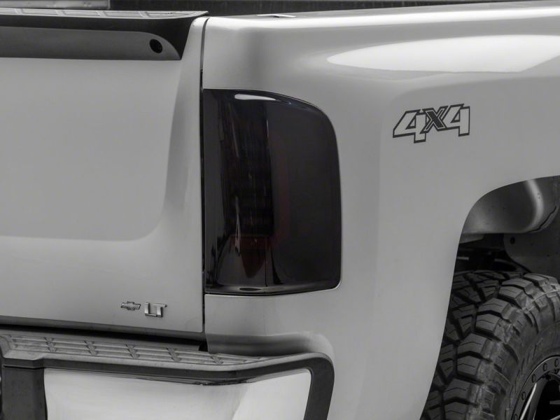 Load image into Gallery viewer, Raxiom 07-14 Chevrolet Silverado 1500 Axial Series LED Tail Lights- Blk Housing (Smoked Lens)