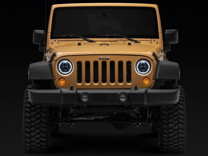 Load image into Gallery viewer, Raxiom 07-18 Jeep Wrangler JK Axial 7-In LED Headlights w/ DRL Turn Signals- Blk Housing (Clear)