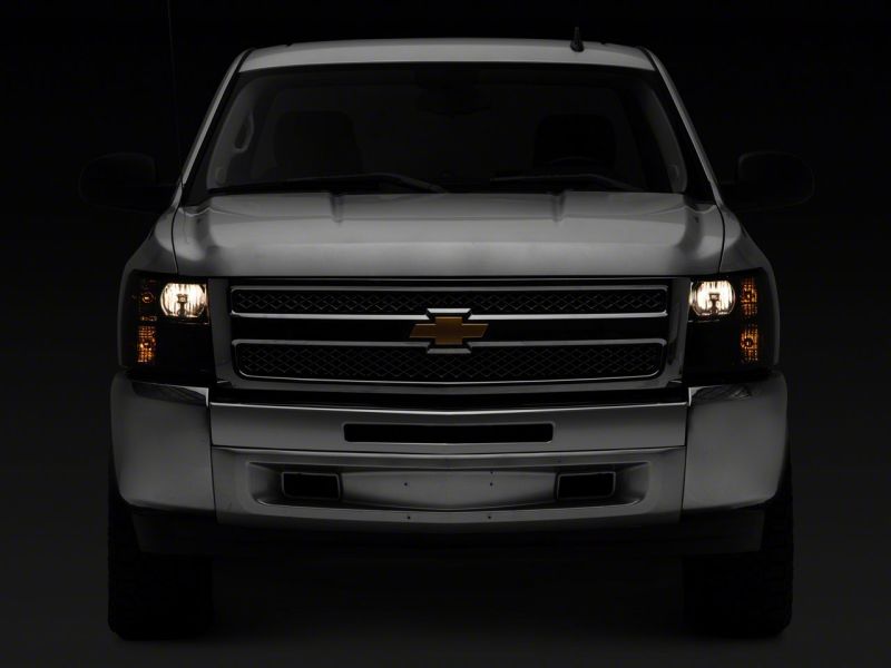 Load image into Gallery viewer, Raxiom 07-14 Chevrolet Silverado 1500 HD Axial OEM Rep Headlights- Chrome Housing- Smoked Lens