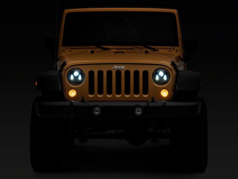 Load image into Gallery viewer, Raxiom 07-18 Jeep Wrangler JK 7-In LED Headlights- Blk Housing (Clear Lens)