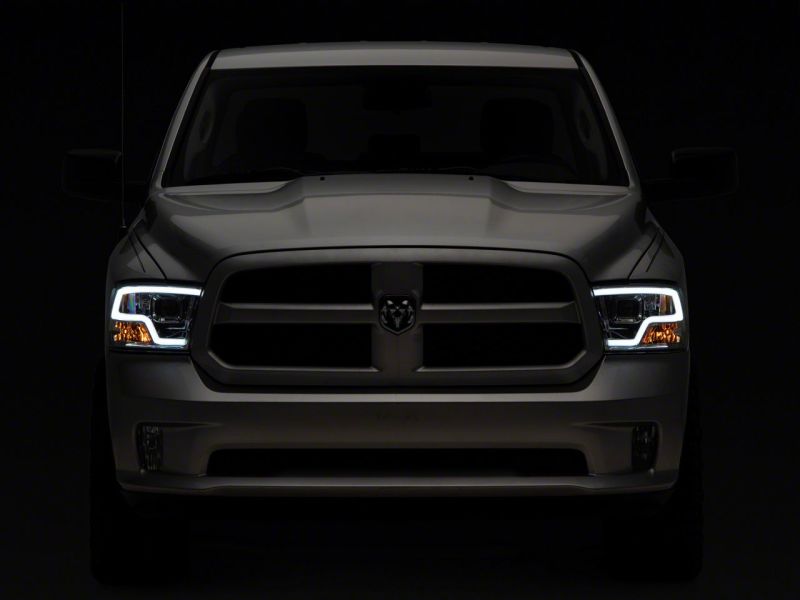 Load image into Gallery viewer, Raxiom 09-18 Dodge RAM 1500 Non-Projector LED Halo Headlights- Chrome Housing (Clear Lens)