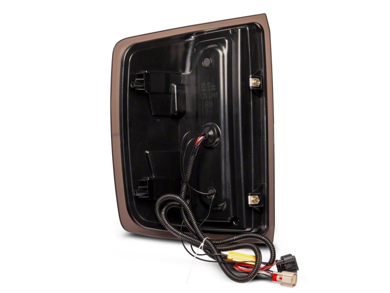 Load image into Gallery viewer, Raxiom 14-18 Chevrolet Silverado 1500 Axial Series LED Tail Lights- Blk Housing (Smoked Lens)