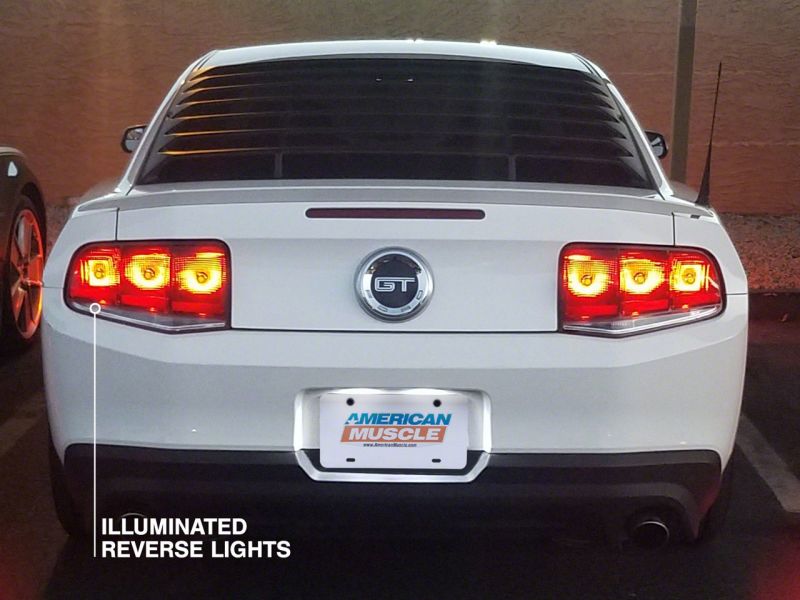 Load image into Gallery viewer, Raxiom 10-12 Ford Mustang Aero Tail Lights- Blk Housing (Smoked Lens)