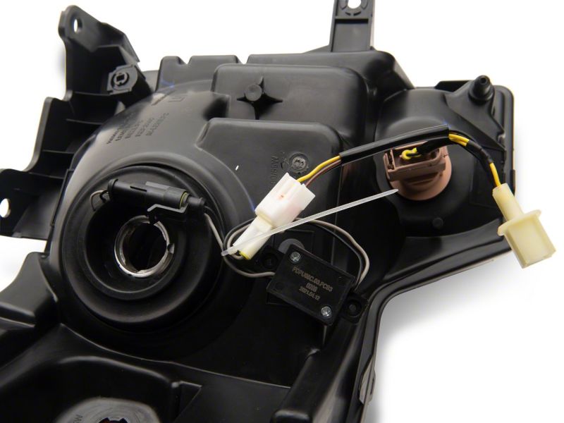 Load image into Gallery viewer, Raxiom 09-14 Ford F-150 Axial Series Headlights w/ LED Bar- Black Housing (Clear Lens)