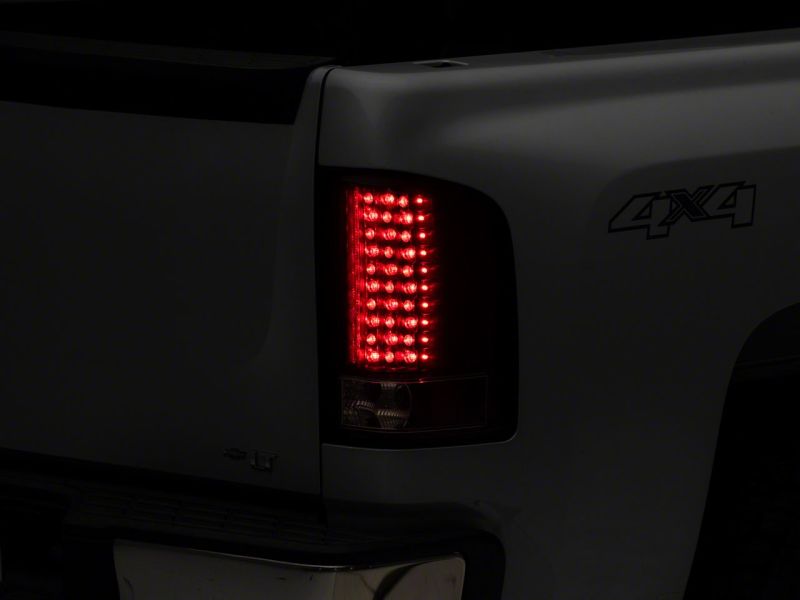 Load image into Gallery viewer, Raxiom 07-13 Chevrolet Silverado 1500 LED Tail Lights- Blk Housing (Clear Lens)