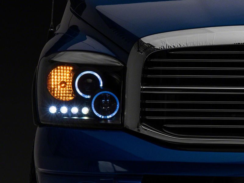 Load image into Gallery viewer, Raxiom 06-08 Dodge RAM 1500 LED Halo Projector Headlights- Black Housing (Clear Lens)