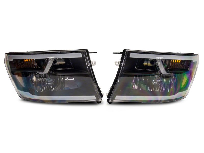 Load image into Gallery viewer, Raxiom 09-18 Dodge RAM 1500/2500/3500 Axial Headlights w/ SEQL LED Bar- Black Housing (Clear Lens)