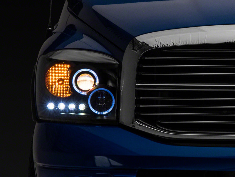 Load image into Gallery viewer, Raxiom 06-08 Dodge RAM 1500 LED Halo Projector Headlights- Black Housing (Clear Lens)
