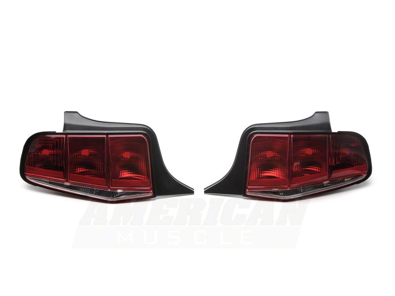 Load image into Gallery viewer, Raxiom 10-12 Ford Mustang Aero Tail Lights- Blk Housing (Smoked Lens)