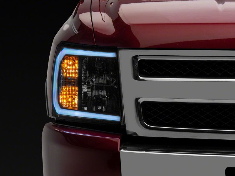 Load image into Gallery viewer, Raxiom 07-13 Chevrolet Silverado 1500 Axial Series Headlights w/ LED Bar- Black Housing (Clear Lens)