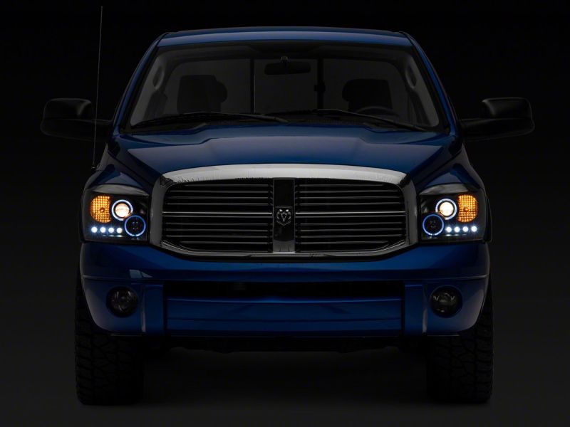 Load image into Gallery viewer, Raxiom 06-08 Dodge RAM 1500 LED Halo Projector Headlights- Black Housing (Clear Lens)
