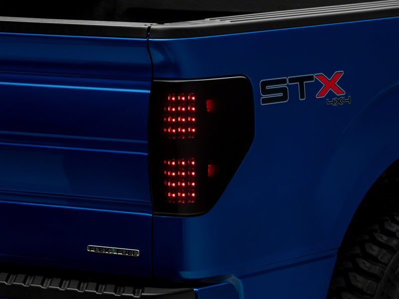 Load image into Gallery viewer, Raxiom 09-14 Ford F-150 Styleside Axial Series LED Tail Lights- Blk Housing (Smoked Lens)