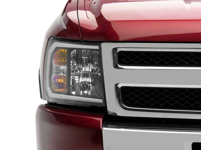 Load image into Gallery viewer, Raxiom 07-13 Chevrolet Silverado 1500 Axial Series Headlights w/ LED Bar- Black Housing (Clear Lens)