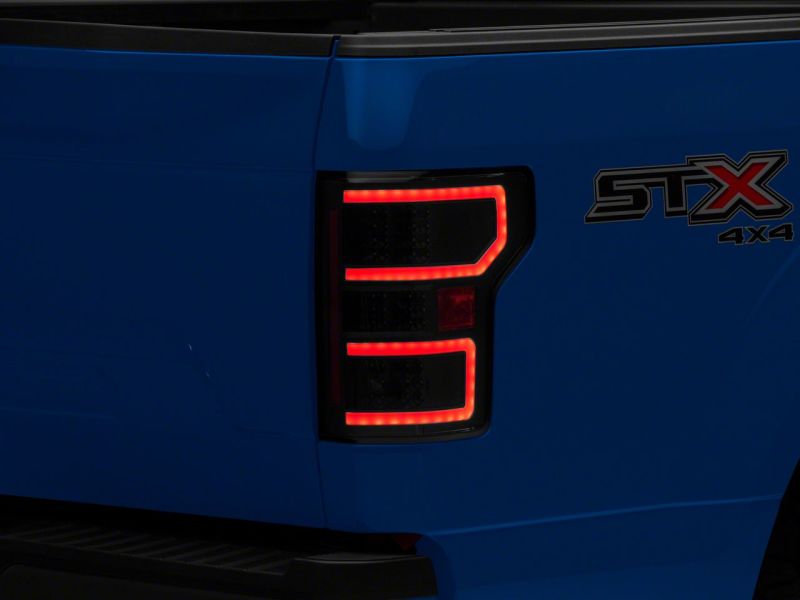 Load image into Gallery viewer, Raxiom 18-20 Ford F-150 LED Tail Lights- Blk Housing (Clear Lens)