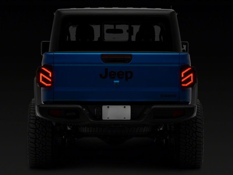 Load image into Gallery viewer, Raxiom 20-23 Jeep Gladiator JT Axial Series LED Tail Lights- Blk Housing (Smoked Lens)