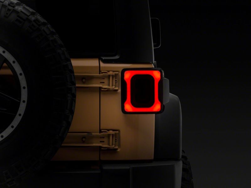 Load image into Gallery viewer, Raxiom 07-18 Jeep Wrangler JK Axial Series Carver LED Tail Lights- Blk Housing (Smoked Lens)