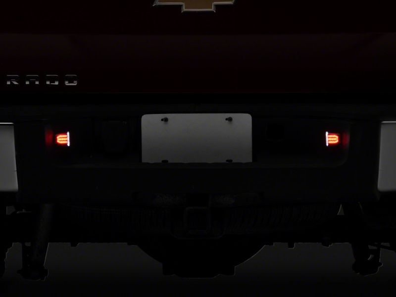 Load image into Gallery viewer, Raxiom 01-13 Chevrolet Silverado 1500 Axial Series LED License Plate Bulbs