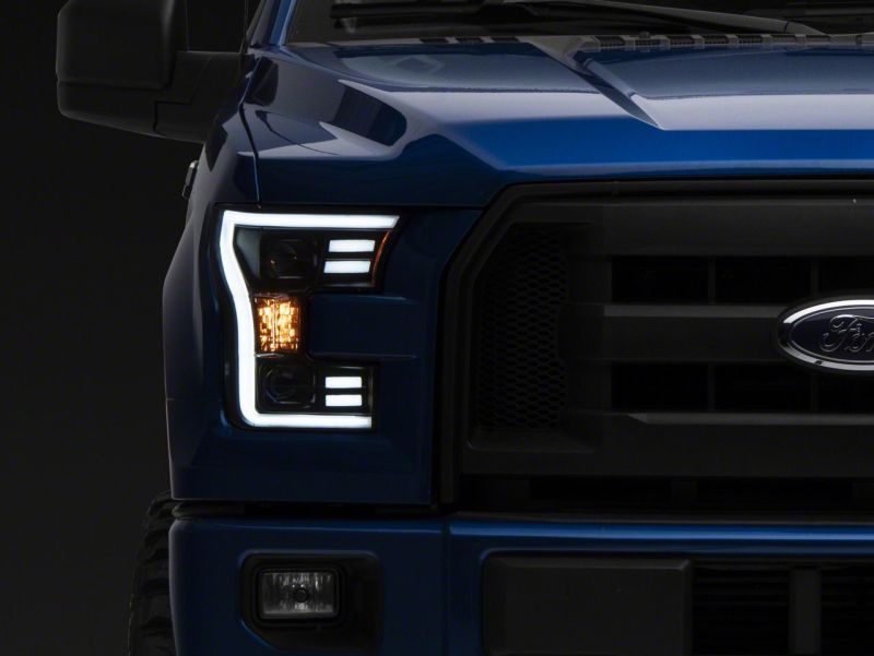Load image into Gallery viewer, Raxiom 15-17 Ford F-150 G3 Projector Headlights w/ LED Accent- Black Housing (Clear Lens)