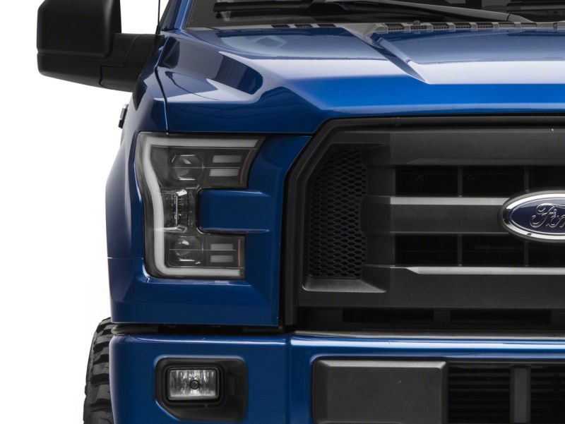 Load image into Gallery viewer, Raxiom 15-17 Ford F-150 G3 Projector Headlights w/ LED Accent- Black Housing (Clear Lens)