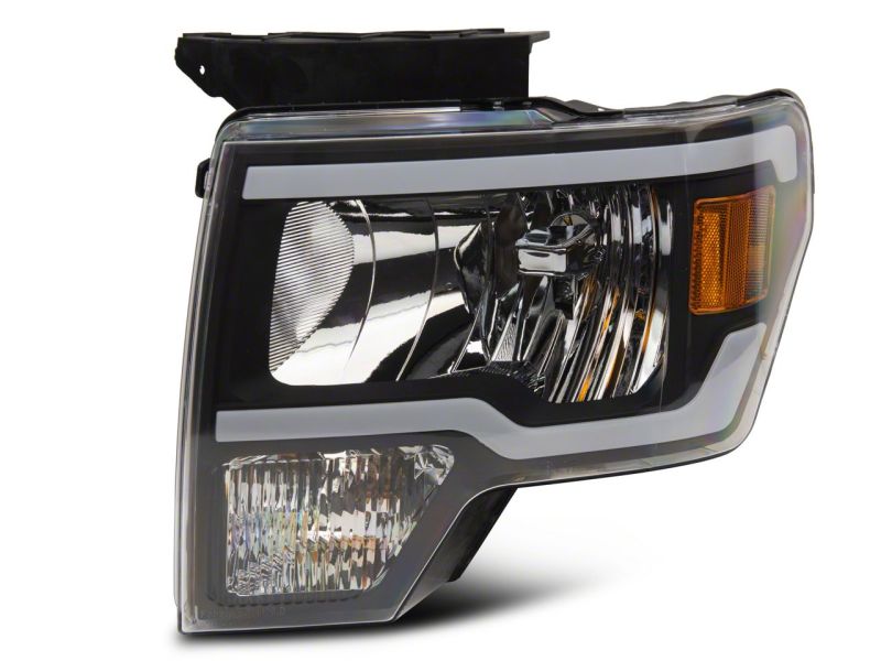 Load image into Gallery viewer, Raxiom 09-14 Ford F-150 Axial Series Headlight w/ SEQL LED Bar- Black Housing (Clear Lens)