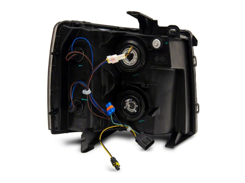 Load image into Gallery viewer, Raxiom 07-13 Chevrolet Silverado 1500 Axial Headlights w/ SEQL LED Bar- Black Housing (Clear Lens)