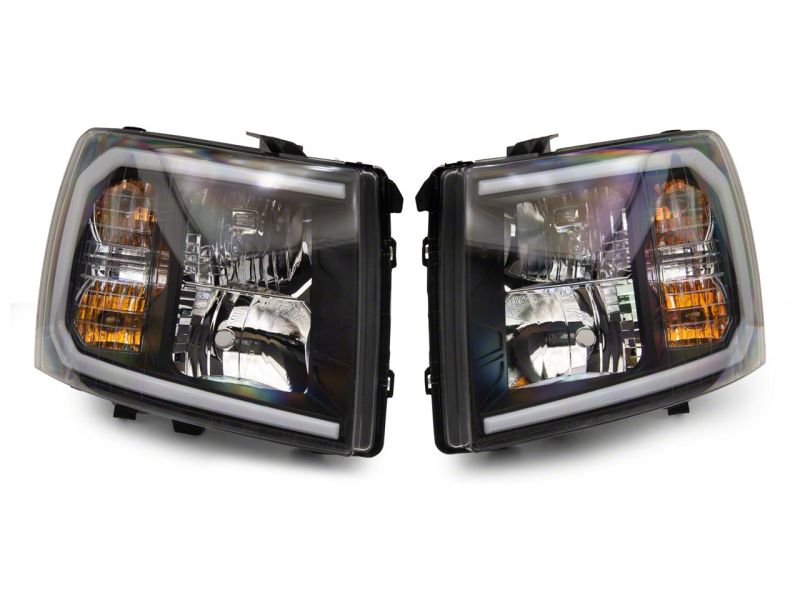 Load image into Gallery viewer, Raxiom 07-13 Chevrolet Silverado 1500 Axial Headlights w/ SEQL LED Bar- Black Housing (Clear Lens)