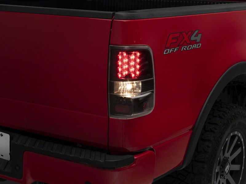 Load image into Gallery viewer, Raxiom 04-08 Ford F-150 Styleside LED Tail Lights- Blk Housing (Clear Lens)