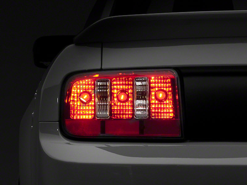 Load image into Gallery viewer, Raxiom 05-09 Ford Mustang Coyote Tail Lights- Chrome Housing - Red/Clear Lens
