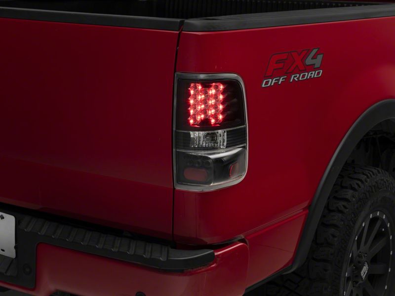 Load image into Gallery viewer, Raxiom 04-08 Ford F-150 Styleside LED Tail Lights- Blk Housing (Clear Lens)