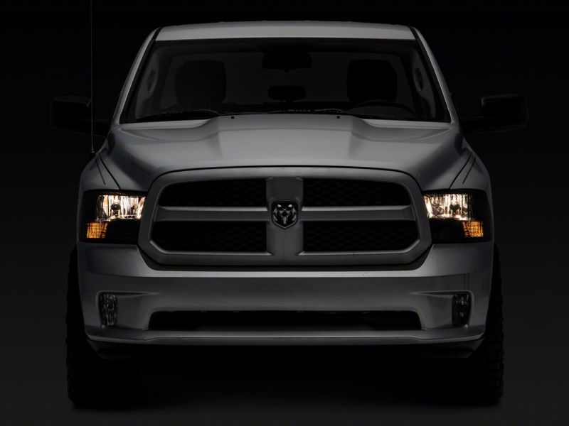 Load image into Gallery viewer, Raxiom 09-18 Dodge RAM 1500 Axial OEM Rep Headlights w/ Dual Bulb- Chrome Housing (Smoked Lens )