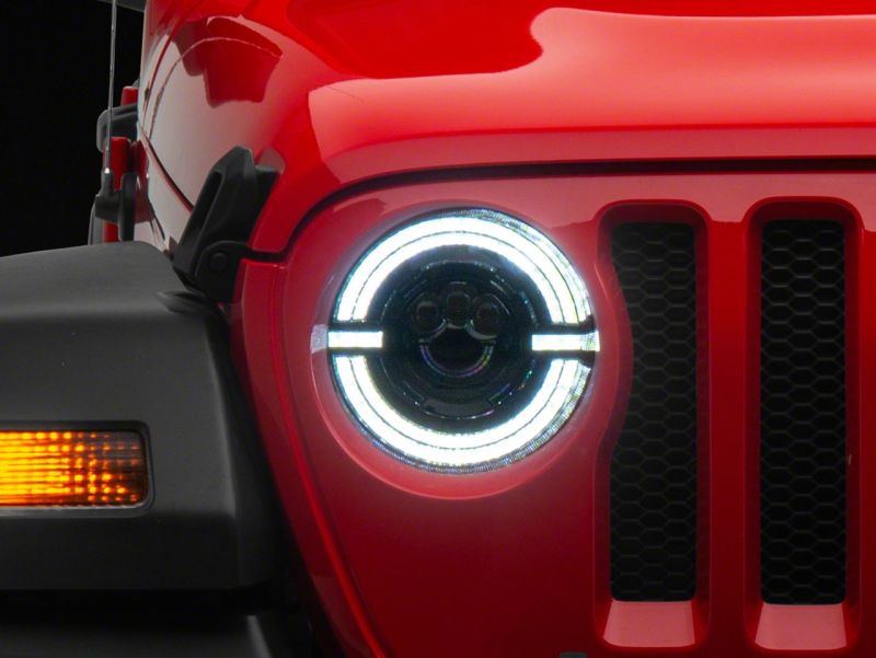 Load image into Gallery viewer, Raxiom 18-23 Jeep Wrangler JL Axial Series 9-In LED Angel Eye Headlights- Black Housing (Clear Lens)