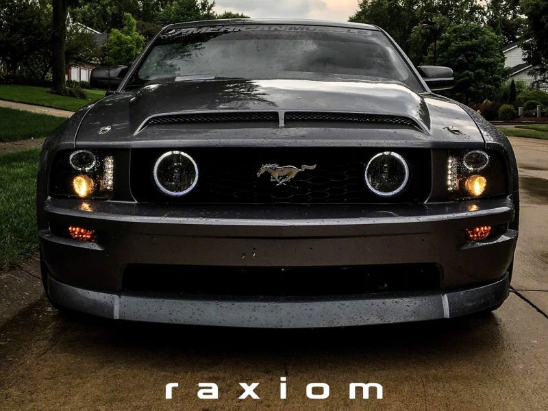Load image into Gallery viewer, Raxiom 05-09 Ford Mustang Excluding GT500 LED Halo Projector Headlights- Black Housing (Clear Lens)