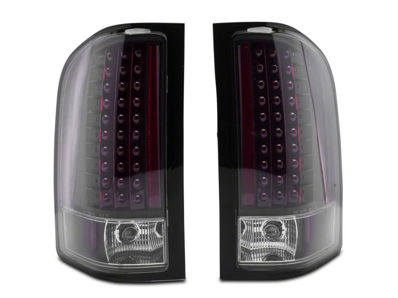 Load image into Gallery viewer, Raxiom 07-13 Chevrolet Silverado 1500 LED Tail Lights- Blk Housing (Clear Lens)