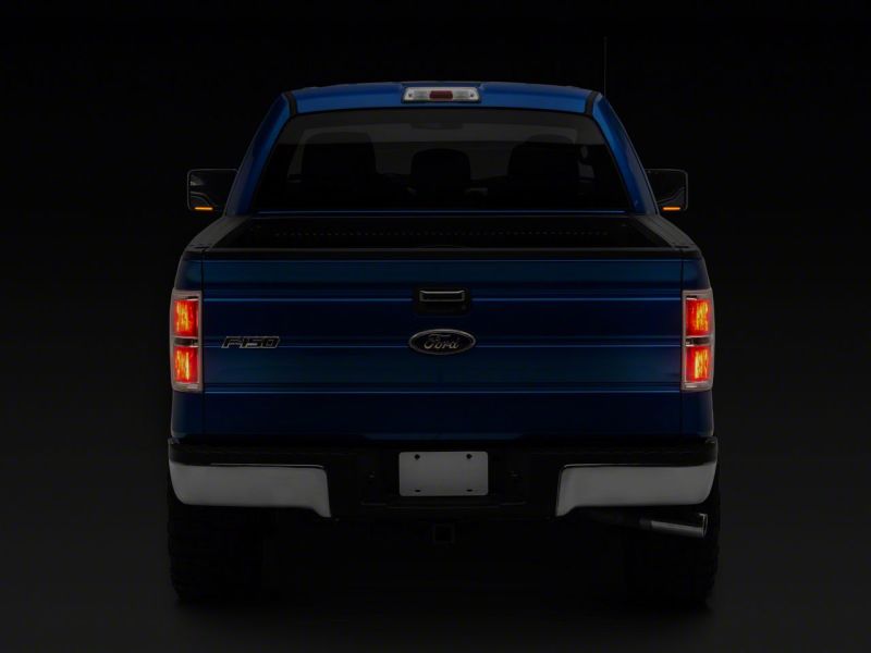 Load image into Gallery viewer, Raxiom 04-14 Ford F-150 Axial Series Side Mirror LED Turn Signal Lights- Smoked