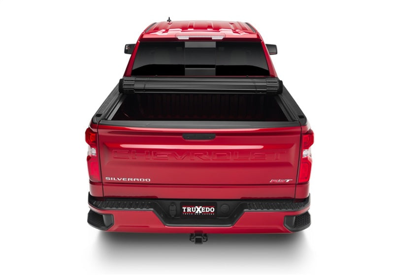 Load image into Gallery viewer, Truxedo 20-21 GMC Sierra & Chevrolet Silverado 1500 (New Body) w/CarbonPro 5ft 9in Sentry CT Cover