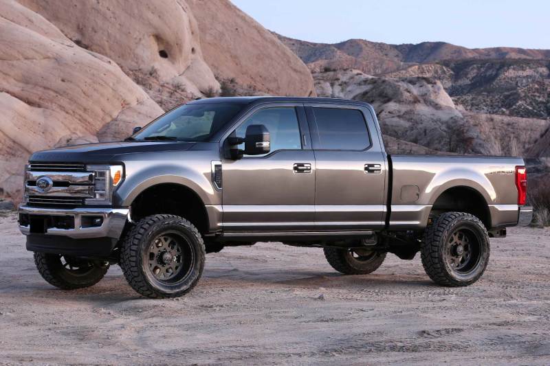 Load image into Gallery viewer, Fabtech 17-21 Ford F250/F350 4WD Diesel 4in Rad Arm Sys w/Coils & Stealth