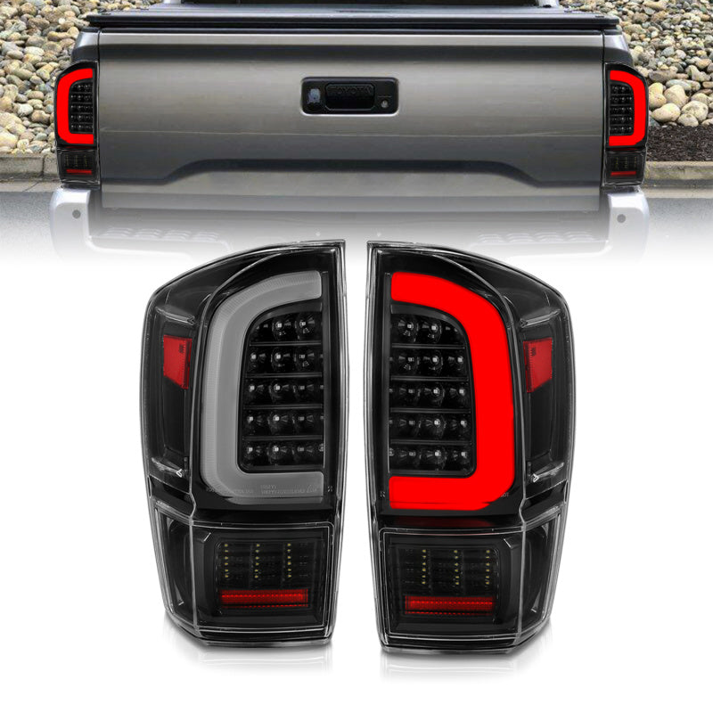 Load image into Gallery viewer, ANZO 16-21 Toyota Tacoma LED Tail Lights - w/ Light Bar Sequential Black Housing & Clear Lens