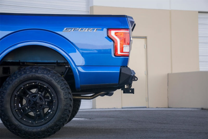 Load image into Gallery viewer, Addictive Desert Designs 15-18 Ford F-150 Stealth Fighter Rear Bumper w/ Backup Sensor Cutout